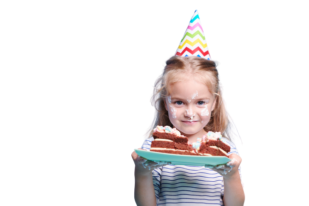 Little girl holding up a piece of cake from a birthday party rentals near me