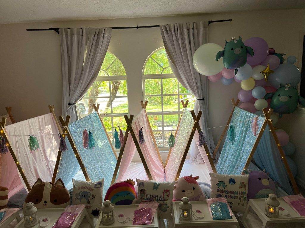 A Teepee-themed room filled with colorful balloons.