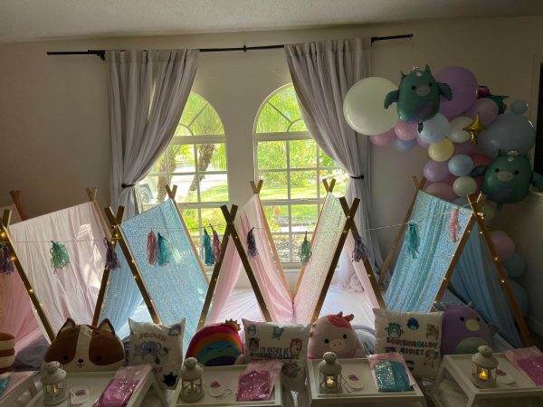 A Teepee-themed room filled with colorful balloons.