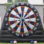 Giant Outdoor Inflatable Soccer Darts Board for the ultimate party experience, featuring soccer balls and darts.
