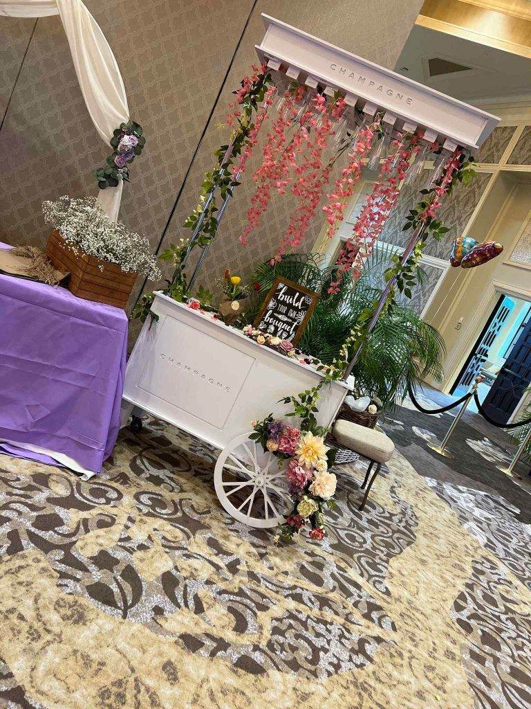 Champagne cart with floral decoration hanging