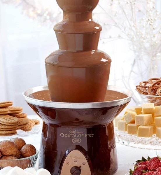 A Chocolate Fountain Rental perfect for a party with cookies and other desserts.
