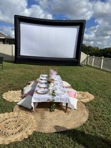 Outdoor Glamping with a Luxury Picnic and an outdoor movie using a 30' inflatable movie projection screen