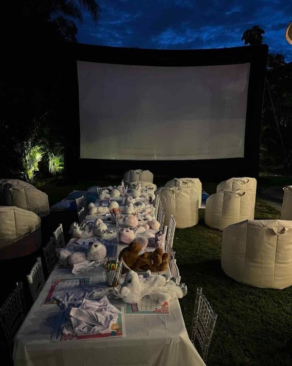 A Teepee-themed outdoor movie screen set up for a baby shower in Lakeland.